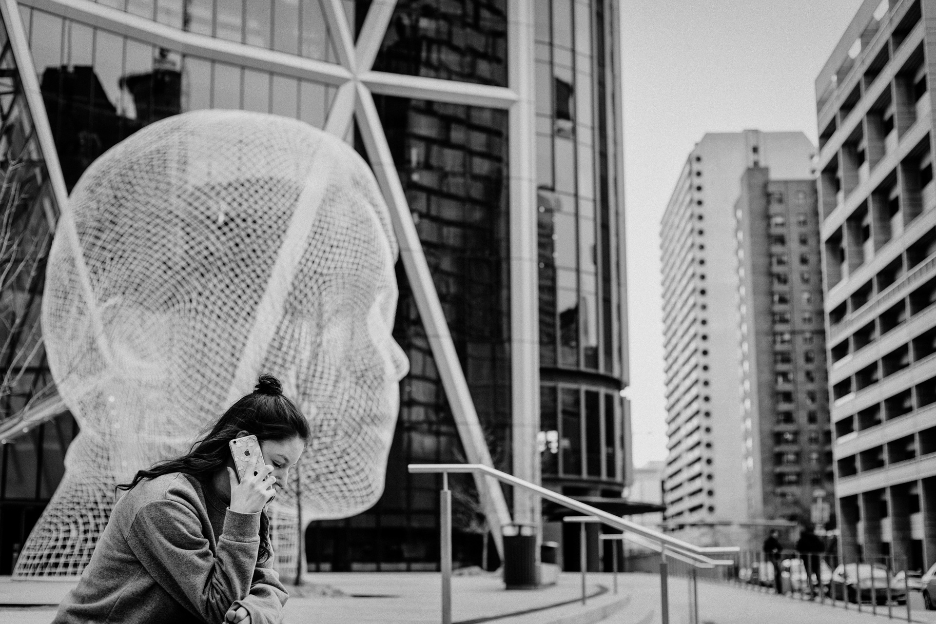 Girl on a phone in a city